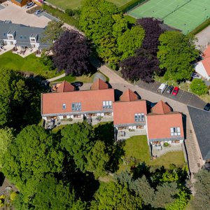 Aerial photograph of Homelands showing the 9 properties and Paxton Centre. 