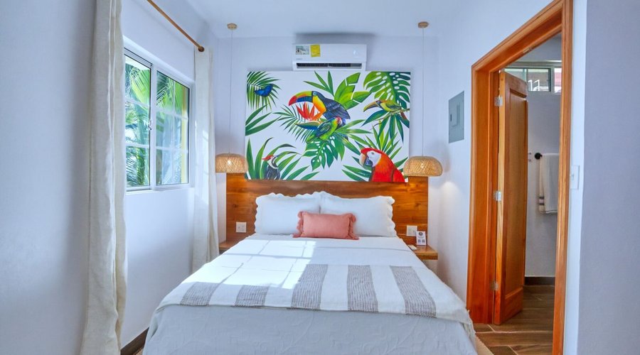 Indulge in the lavish 2 Bedroom Jungle Villa at Villa Massis. Experience the comfort of a newly built villa, boasting a master bedroom with a queen bed and ensuite bathroom, and a second bedroom with a queen bed and its own bathroom. Perfect for families, couples, or a small group of friends, this villa provides all essentials, including a well-equipped kitchenette with tableware. Savor delectable meals crafted by a local chef, available upon request.