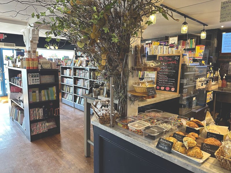 Library with cafe counter displaying pastries