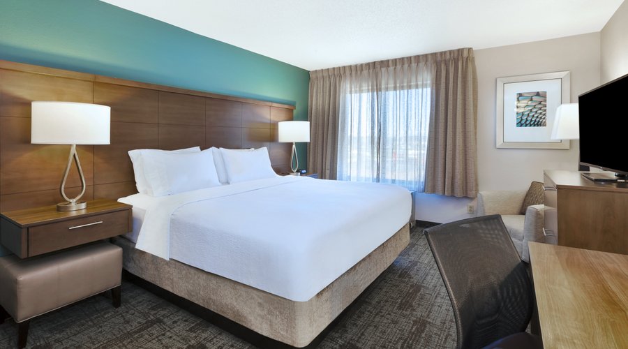 Our standard king room has a smaller kitchenette with a generous bathroom.