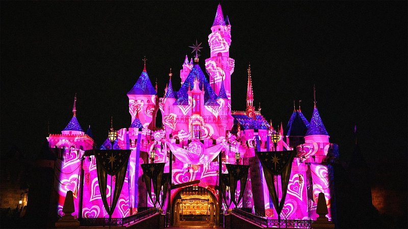 Castle lit up for Disney After Dark, at Disneyland, in Anaheim, California
