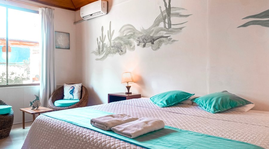 Double premium room, it has a king size bed, small living room, private bathroom, air conditioning, desk, closet, bathroom amenities.