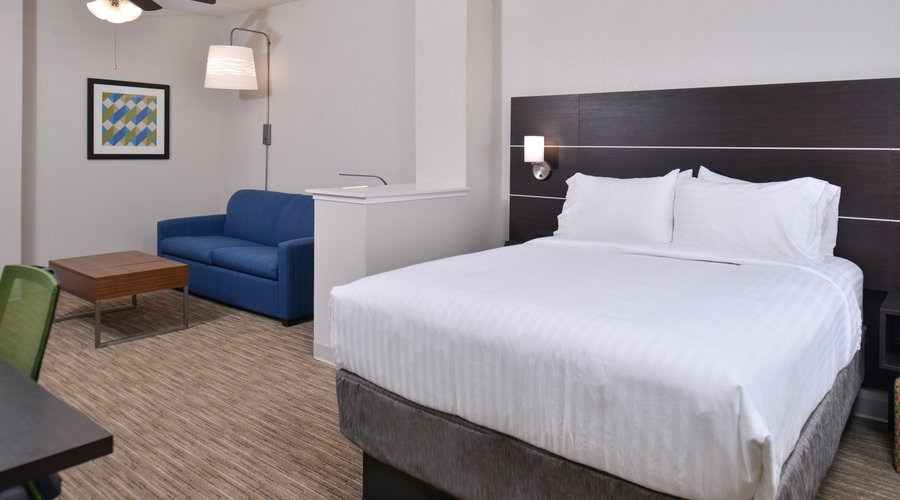 Treat yourself to a great stay in our Queen Bed in Two Bed Suite.