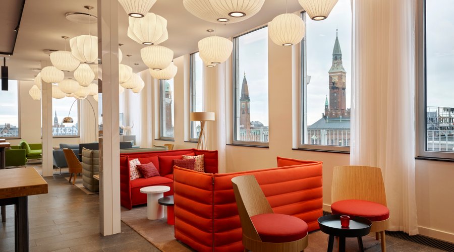 Part of the living room of citizenM Copenhagen Radhuspladsen