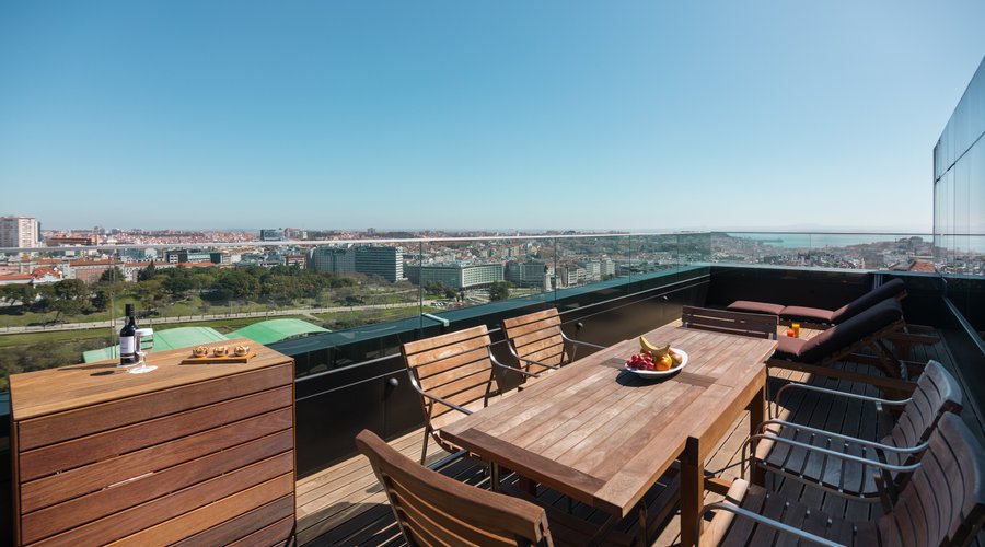 Enjoy a large private terrace with panoramic views over the city.