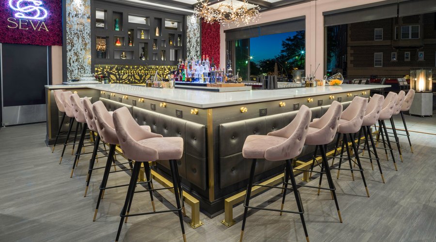 Our bar opens to the patio to enjoy the summer months.