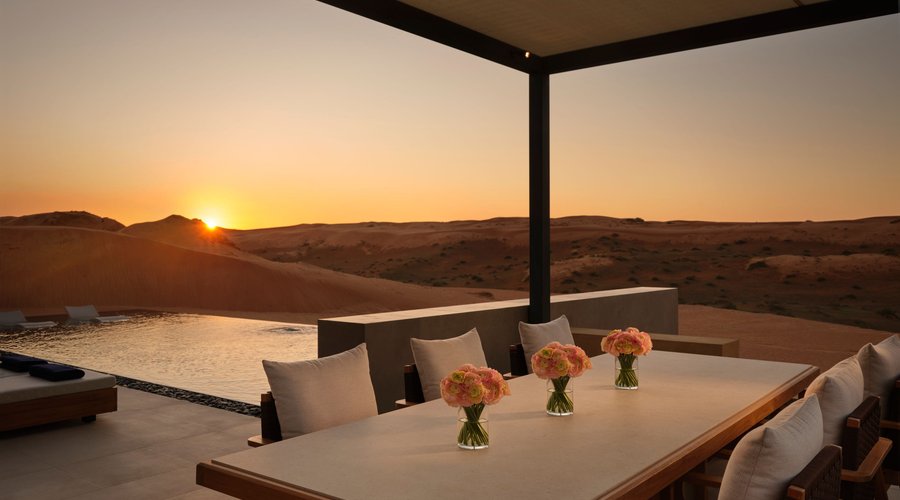 Outdoor dining table with sunset