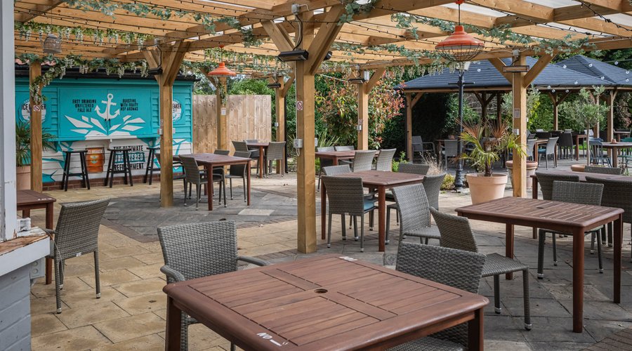 Outdoor pub seating area in beer garden