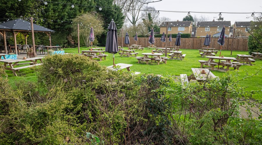 Outdoor pub seating area in beer garden