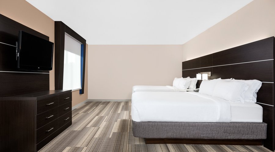 Two Queen size beds with a Queen Sofa Sleeper
