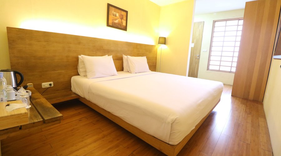 Chamomile Deluxe Room  Comfy Deluxe Room with indulgent amenities which ideal for a couple and small family.  