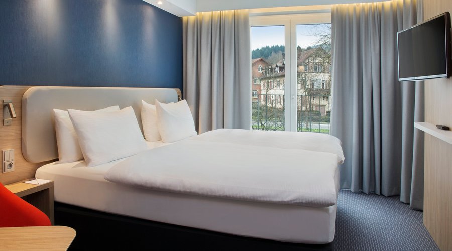 An airy twin room with comfortable bedding and inclusive Wi-Fi.