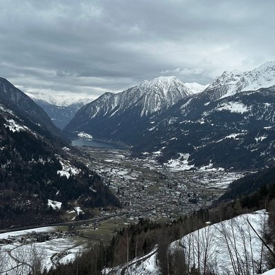 The snowy mountain view outside the Bernina Express.