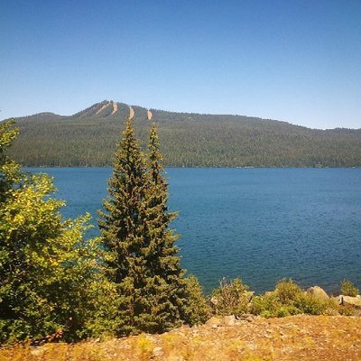 View of a lake from the window of the Coast Starlight Train.