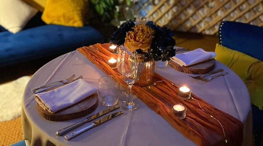 Experience a romantic dinner for two in the yurt, illuminated by candlelight. A private chef will cater to your every need, ensuring an unforgettable evening of culinary delight and intimacy.