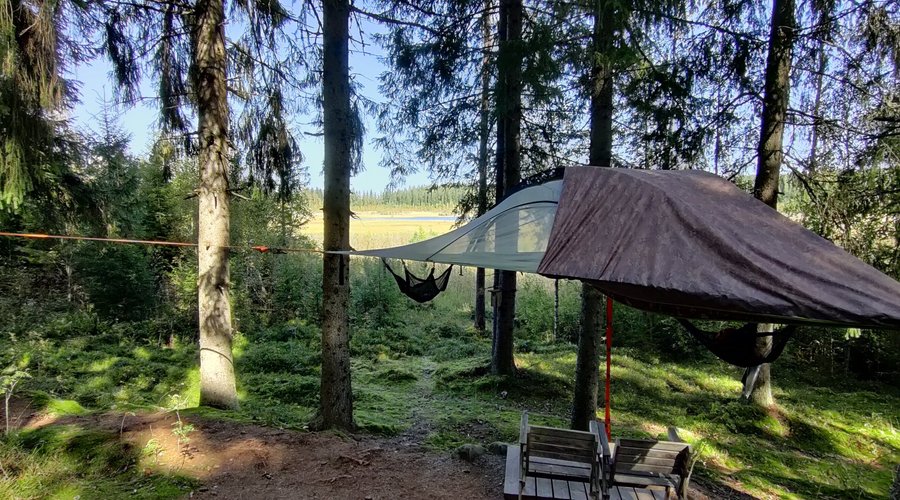 Tentsile | This is a handy way to have the rain cover on the tent: it's easy to pull for cover when needed but gives you the views and the air flow inside the tent.