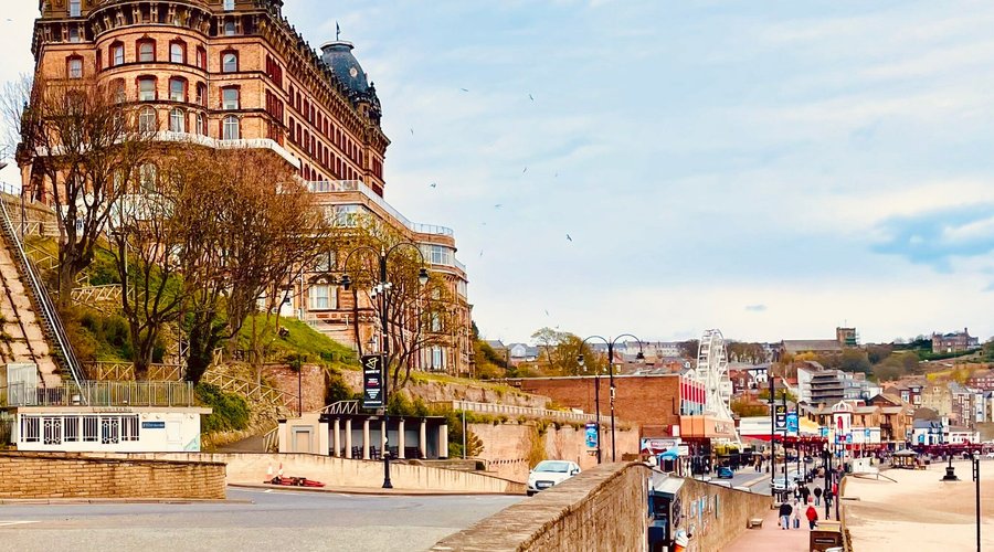 The majestic Grand Hotel ( built 1867) directly overlooks the beach and promenade , with all its lively seaside attractions.
