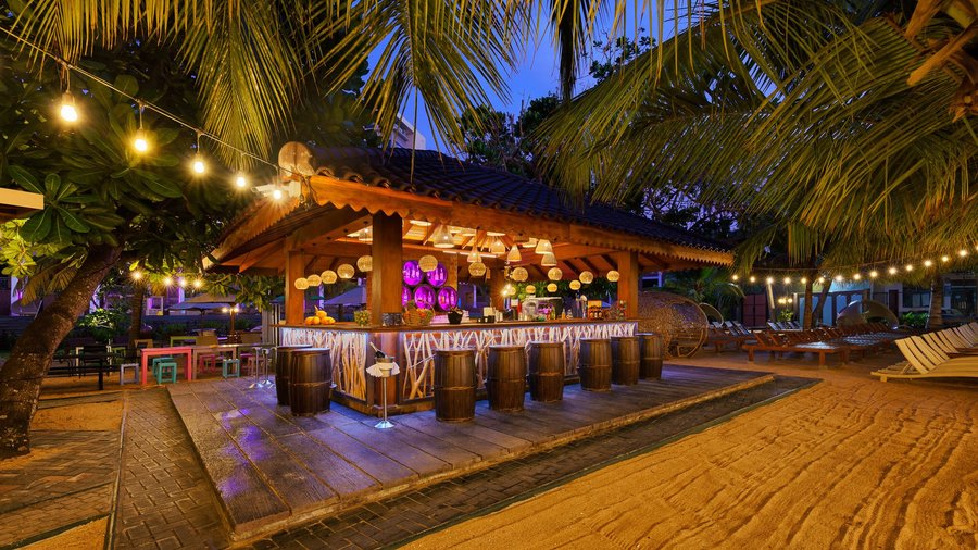 Unwind in tropical bliss at the Tiki Bar by the Beach in Araliya Beach Resort, Unawatuna. Sip on exotic cocktails while lounging in the shade of swaying palm trees. With the gentle ocean breeze and stunning views, it's the perfect spot to relax and soak up the coastal ambiance. Whether enjoying a refreshing drink or indulging in tasty snacks, the Tiki Bar offers a slice of paradise by the sea.