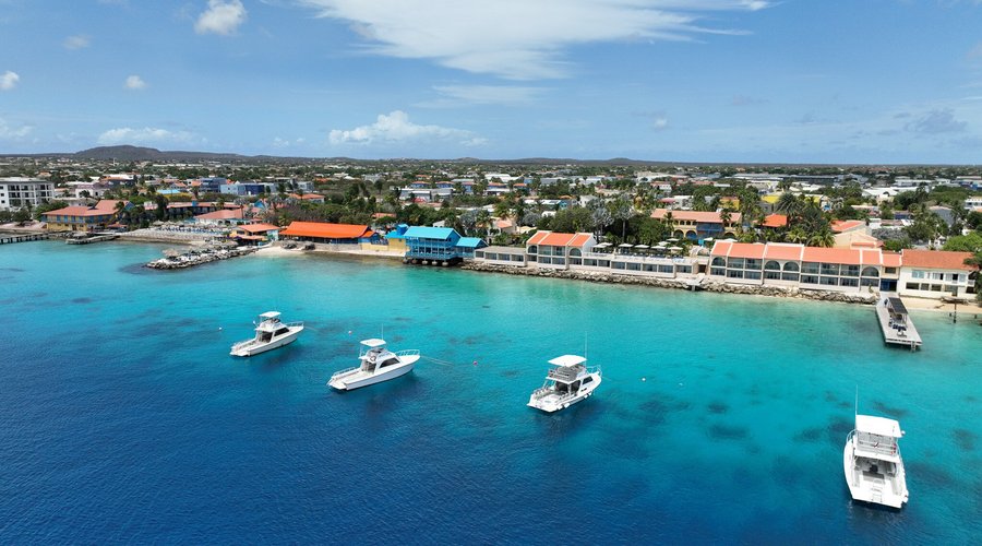 View of the resort and dive boats from the ocean