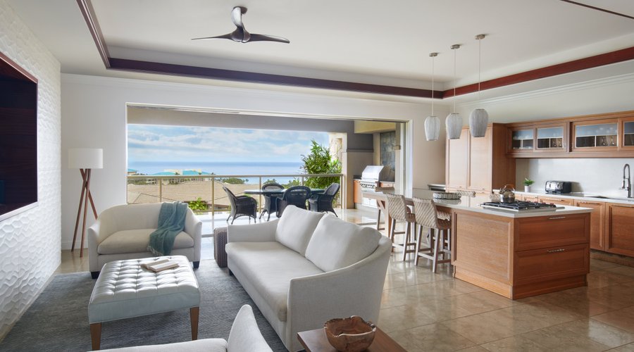 Deluxe Ocean Views in the comfort of your spacious living area and luxurious full-size kitchen