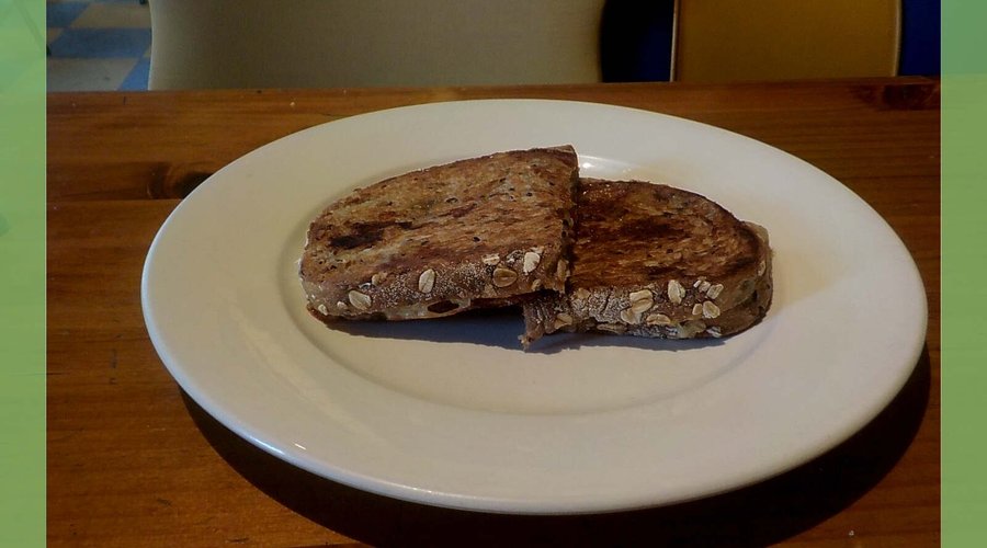 toasted cheese and tomato sandwich on pumpkin bread