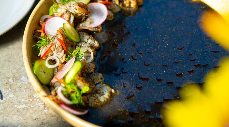 Black Aguachile Fresh aguachile of shrimp, scallops, radish, spring onion with black recado (Yucatecan preparation of spices and chili ashes) avocado leaf and green herb oil. @jardinsecretobrunch