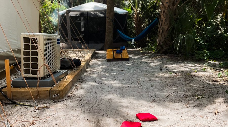 Camping and Glamping with AC in Koreshan State Park in Estero between Fort Myers and Naples and not too far from Miami.  cornhole while glamping