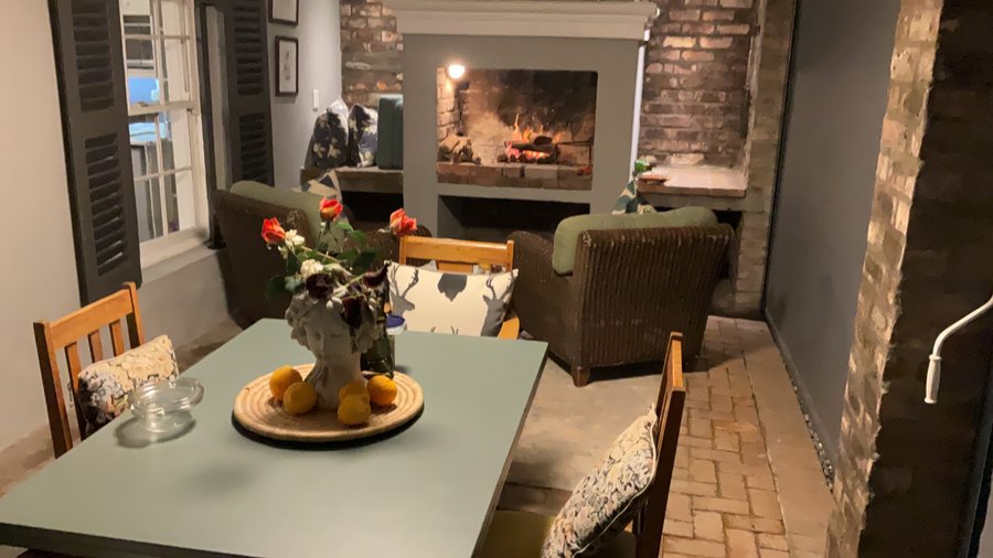 Private veranda area with fireplace