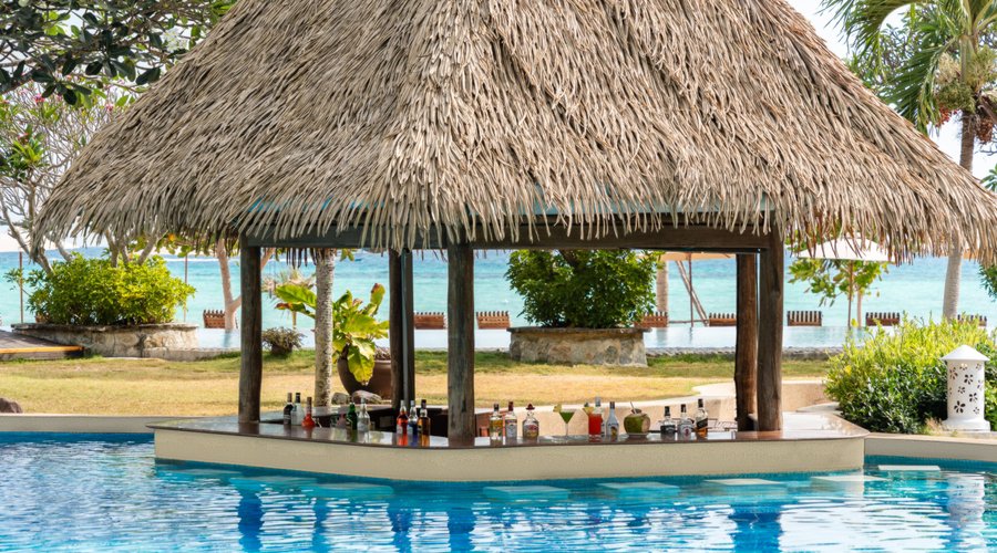 Enjoying swimming pools while escaping to a pristine private beach