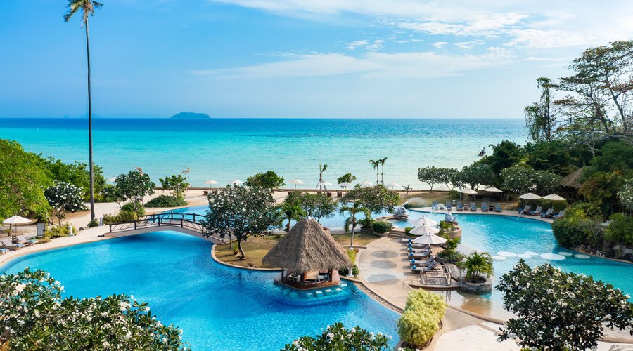 Enjoying swimming pools while escaping to a pristine private beach