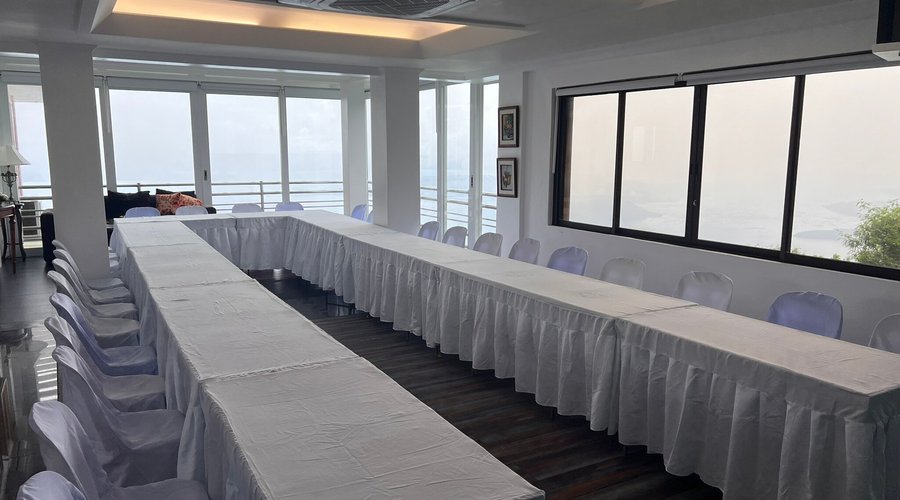 Long table setup for conferences with a view 