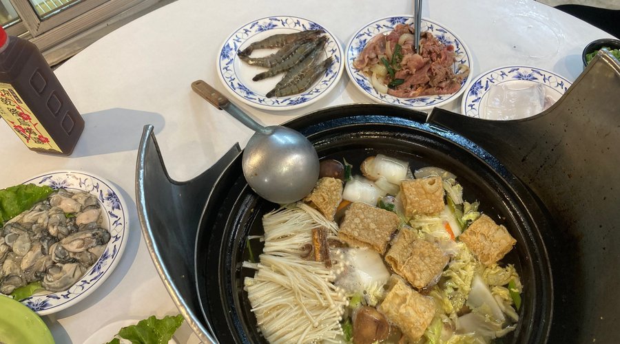 Delicious hot pot with many options: vegetables, seafood, shrimp, meat, noodles, mushrooms, etc.