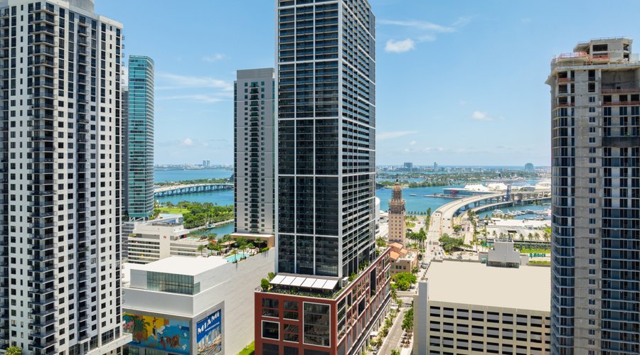 Gale Miami Hotel & Residence: A beautiful building with a red brick base and a 51-story tower.