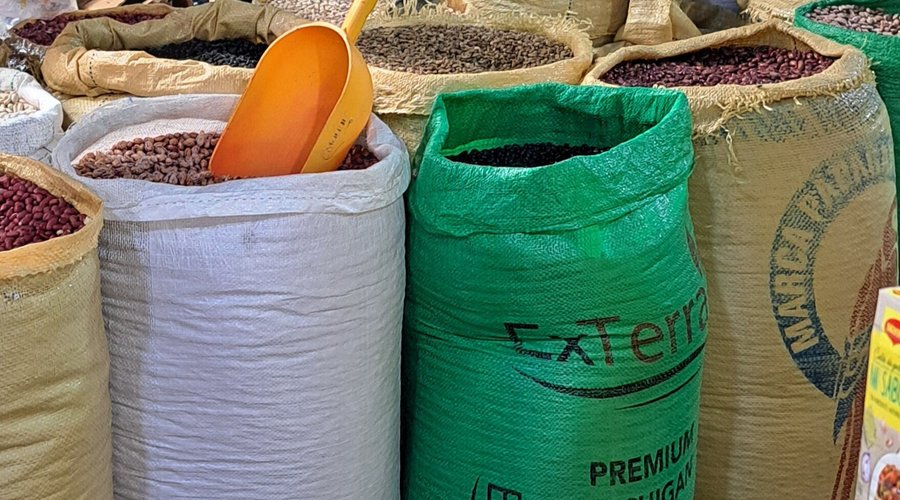 Bags of beans along the street in the Market 