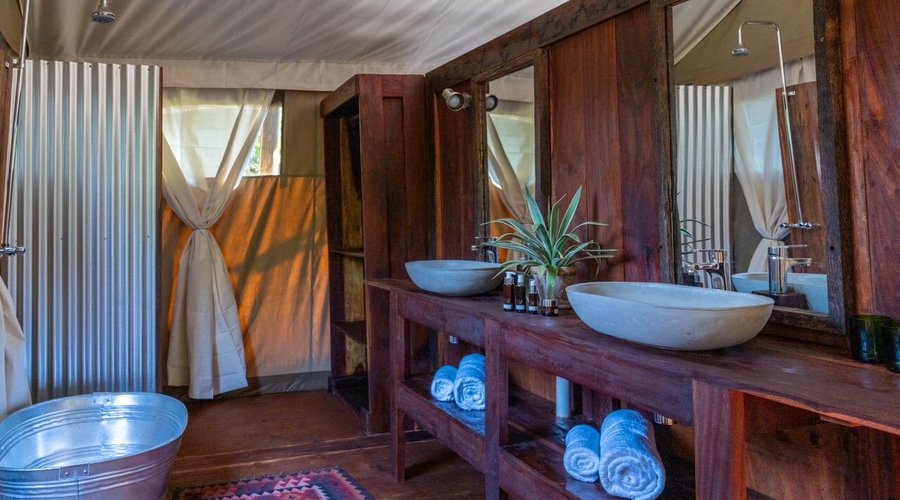 Each en-suite bathroom has two basins, shower, toilet and outdoor shower. 
