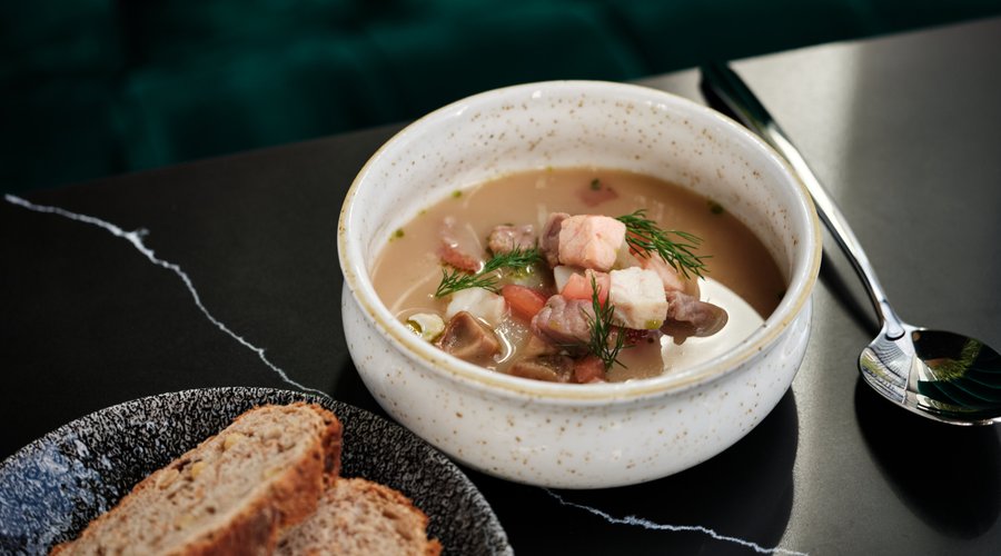 Fish soup with sour cream and dill