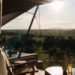 Each of our Sanctuary Tented Suites have their own deck with a  plunge pool overlooking the Serengeti savannah