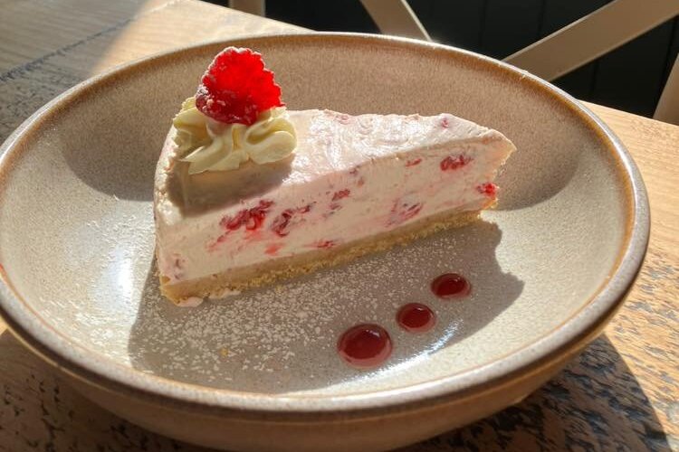 Homemade lemon and raspberry cheesecake