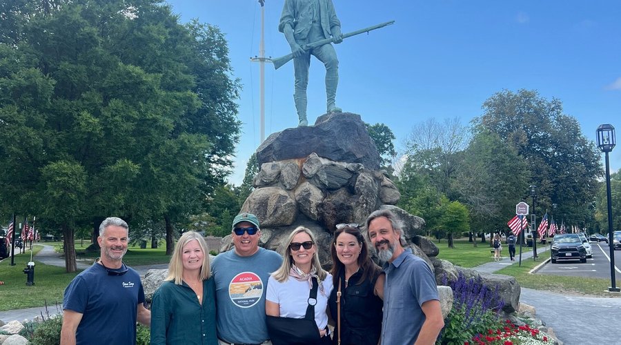 The entire group with the statue
