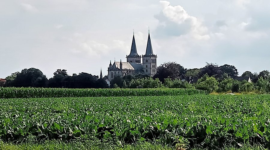View on Xanten with Dom from the Rhine river. North Rhine-Westphalia, Germany. July 2024.