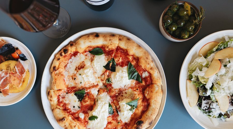 Enjoy wood-fired pizza, farm-to-table sides, wine, and more at the Farmstead Wine Bar.