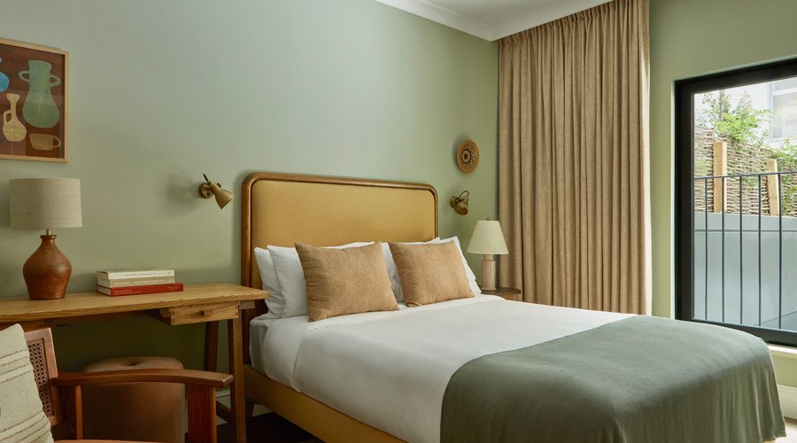 The Classic - Our Classic rooms are ideal for shorter stays, overlooking the interior patio or Carrer de la Fusina. Guests can enjoy Brilliantly Considered interiors inspired by the El Born neighbourhood with warm tones, Spanish furniture, and a selection of local artwork. Curl up in the reading corner with a good book, unwind under the rainfall shower, or enjoy a freshly made cup of tea or coffee. When it’s time to rest, sink into a blissful sleep in your hand-crafted queen bed.