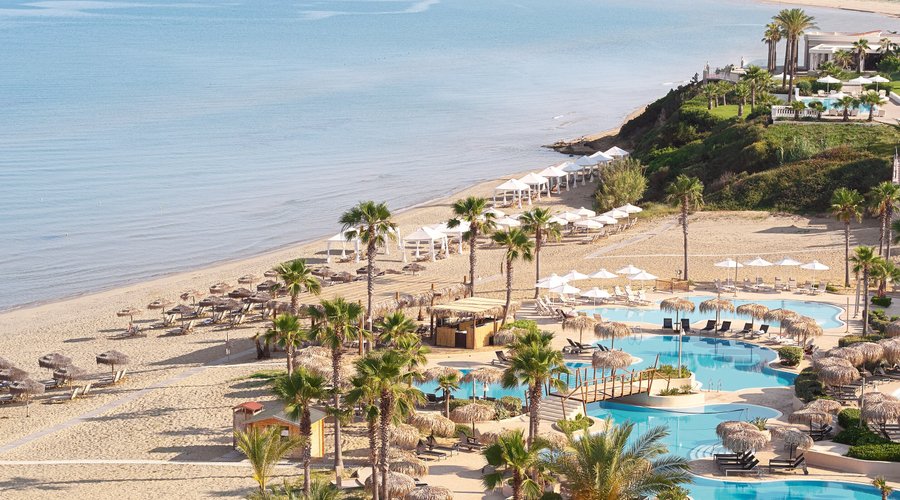 Sandy beach with shallow waters and pools