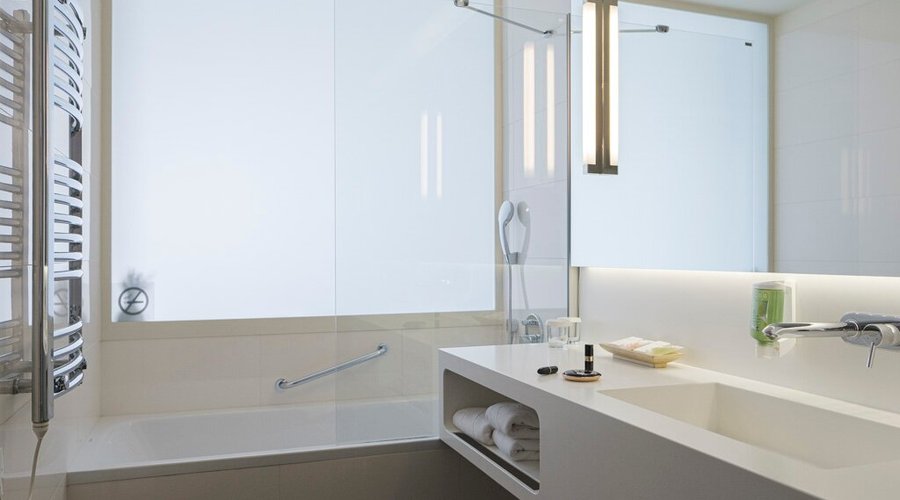 Superior room bathroom. All of bathrooms are having shower cabin and bath tub 