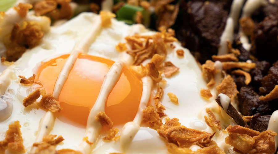 A fried egg makes everything better—let's crack into flavour! 