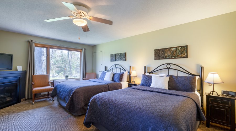 Room with two queen beds.