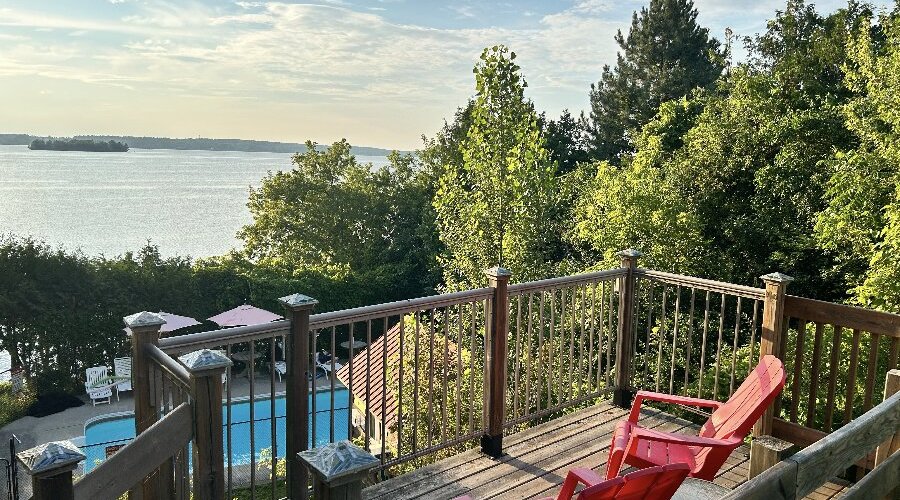 A lake view deck above of the pool