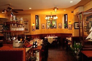 Dining room is cozy, offer French fare from a traditional Brasserie