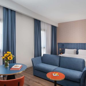 NH Catania Centro Room Junior Suite With Terrace Sofa Curtains Closed