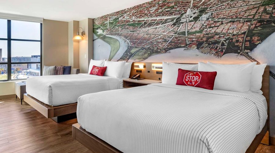 Spacious City View Two Queen Beds guest room and view of Audi Field